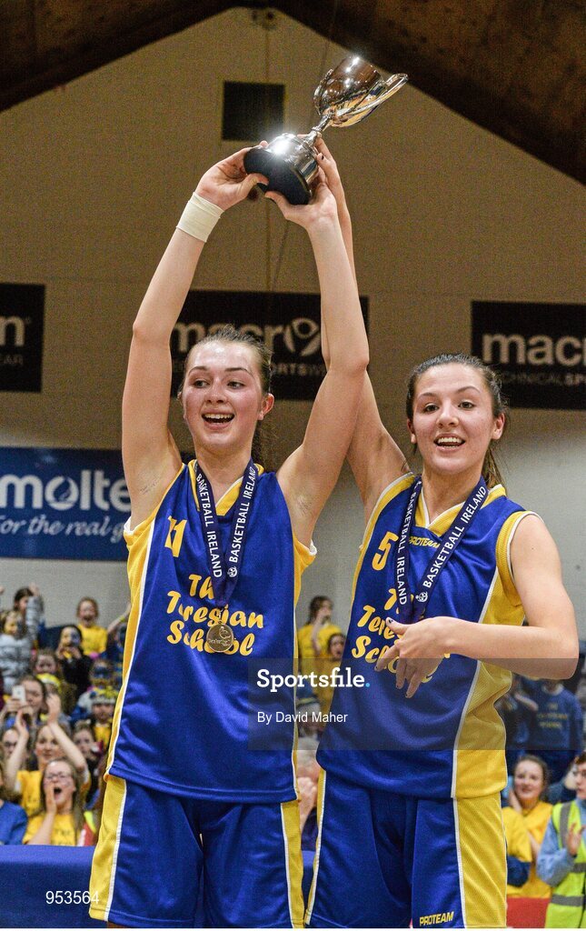 20 January 2015;  The Teresian School joint captains Allison McGrath, left, and Sophie Barron celebrate with the cup at the end of the game. All-Ireland Schools Cup U19B Girls Final, The Teresian School v Glanmire Community College, National Basketball Arena, Tallaght, Dublin. Picture credit: David Maher / SPORTSFILE
