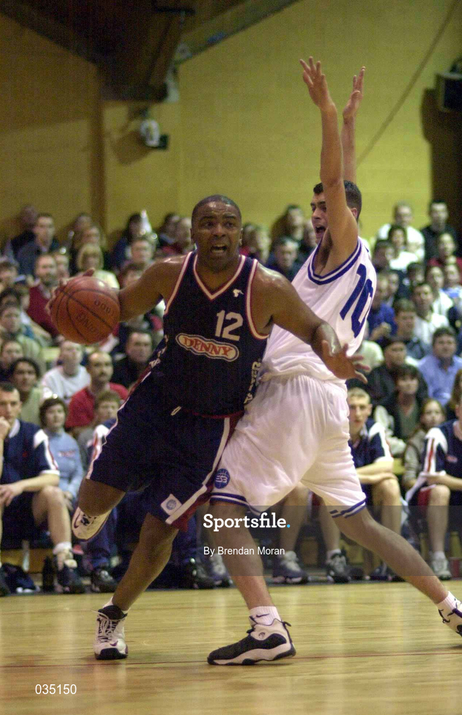 30 January 2000; Anthony Jenkins of Denny Notre Dame in action against Brian Tonkovich of St Vincent's during the Senior Men's Sprite Cup Final match between Denny Notre Dame and St Vincent's at the National Basketball Arena in Tallaght, Dublin. Photo by Brendan Moran/Sportsfile