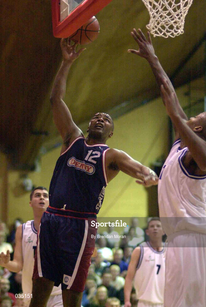 30 January 2000; Anthony Jenkins of Denny Notre Dame in action against Ferdinand Williams of St Vincent's during the Senior Men's Sprite Cup Final match between Denny Notre Dame and St Vincent's at the National Basketball Arena in Tallaght, Dublin. Photo by Brendan Moran/Sportsfile