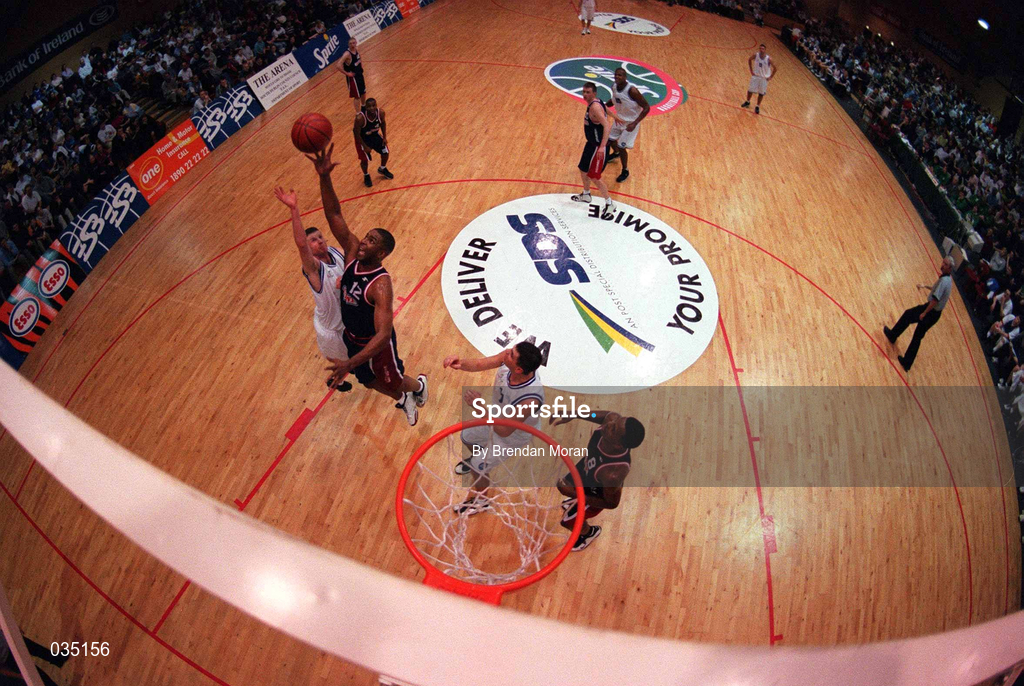 30 January 2000; Anthony Jenkins of Denny Notre Dame, 12, reaches highest to claim possession during the Senior Men's Sprite Cup Final match between Denny Notre Dame and St Vincent's at the National Basketball Arena in Tallaght, Dublin. Photo by Brendan Moran/Sportsfile
