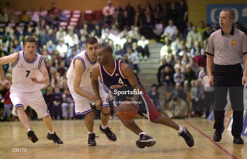 30 January 2000; Brian Benjamin of Denny Notre Dame in action against Stephen McGurk, centre and Gerry Noone, 7, of St Vincent's during the Senior Men's Sprite Cup Final match between Denny Notre Dame and St Vincent's at the National Basketball Arena in Tallaght, Dublin. Photo by Brendan Moran/Sportsfile