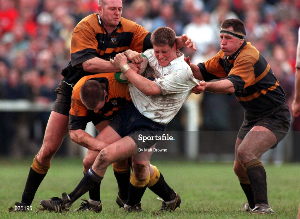 25 April 1999; Ronan O'Gara of Cork Constitution is tackled by Buccaneers players, from left, Colm Rigney Martyn Steffert, top, and Des Rigney during the AIB Rugby League Division 1 Semi-Final match between Cork Constitution v Buccaneers at Temple Hill in Cork. Photo by Matt Browne/Sportsfile