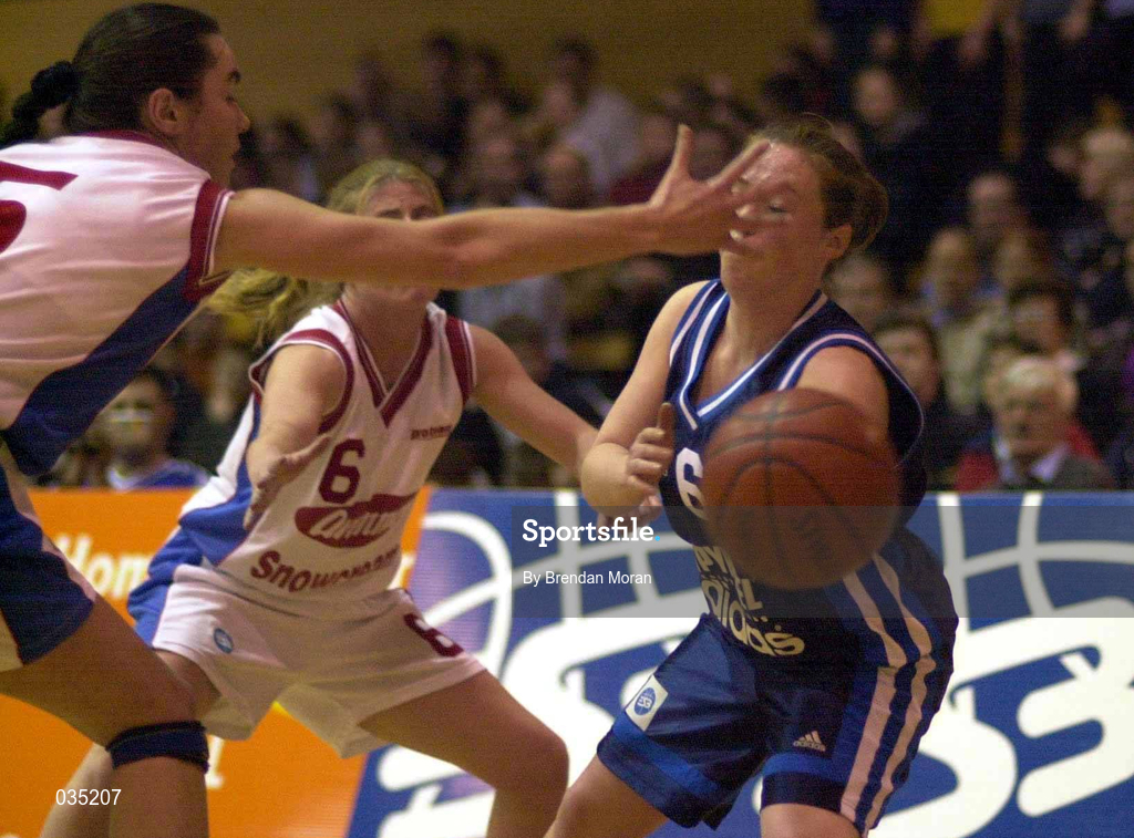 29 January 2000; Ciara Fenton of Killester in action against Jillian Hayes, left, and Olivia O'Reilly, 6, of Avonmore Wildcats during the Senior Women's Sprite Cup Semi-Final match between Avonmore Wildcats v Killester at the National Basketball Arena in Tallaght, Dublin. Photo by Brendan Moran/Sportsfile