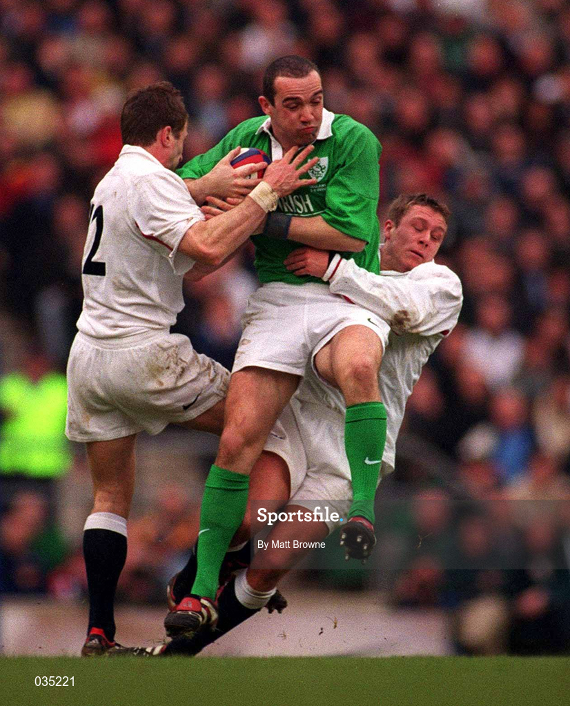 5 February 2000; Conor O'Shea of Ireland  is tackled by Mike Catt and Jonny Wilkinson, right, of England during the Lloyds TSB 6 Nations match between England and Ireland at Twickenham Stadium in London, England. Photo by Brendan Moran/Sportsfile