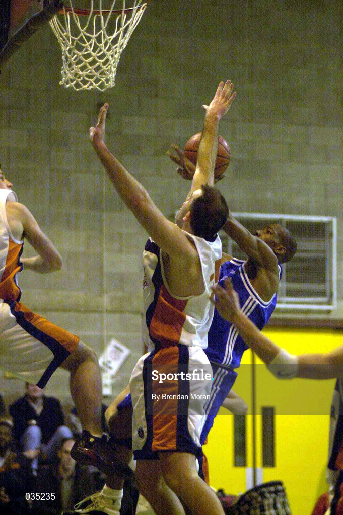 19 December 1999. Damon Schultz of Killester in action against John Leahy of Star of the Sea during the ESB Men's Superleague Basketball match between Killester and Star of the Sea at IWA in Clontarf in Dublin. Photo by Brendan Moran/Sportsfile