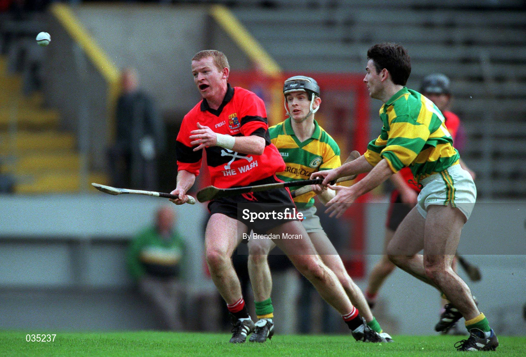 31 October 1999; Dan Murphy of UCC gets past Brian O'Keeffe of Blackrock during the Cork County Senior Club Hurling Championship Final match between Blackrock and UCC at Páirc Uí Chaoimh in Cork. Photo by Brendan Moran/Sportsfile