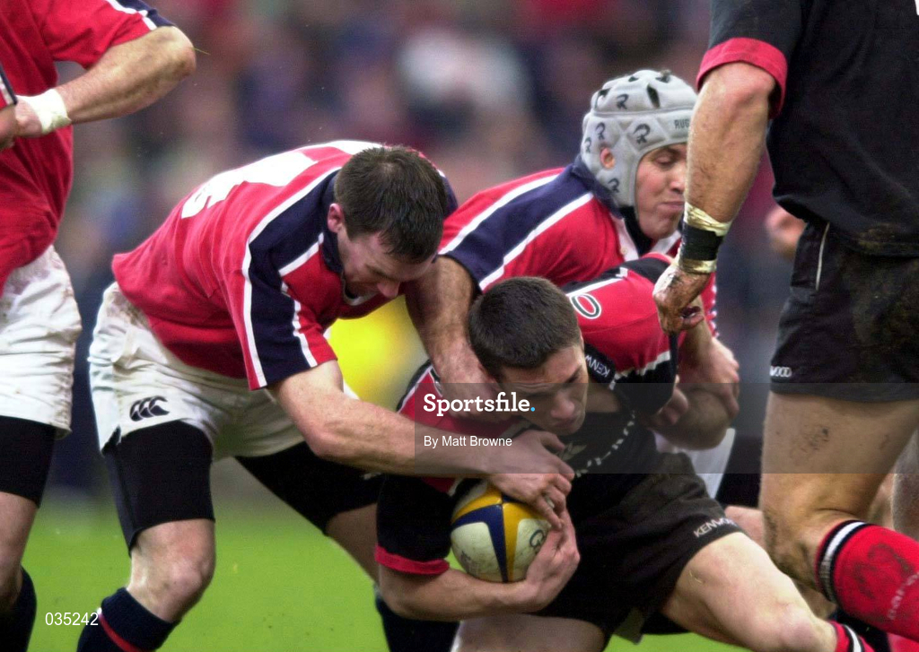 8 January 2000. Daragh O'Mahony of Saracens is tackled by John Kelly, left, and Michael Mullins of Munster during the Heineken Cup Pool 4 Round 5 match between Munster and Saracens at Thomond Park in Limerick. Photo by Matt Browne/Sportsfile