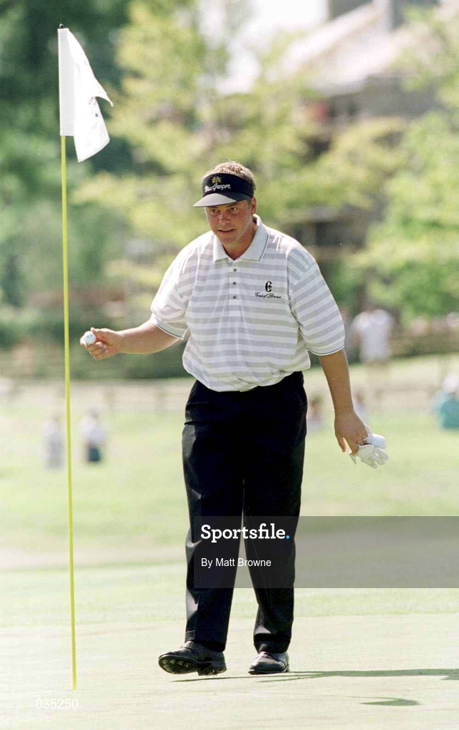 1 August 1999;  Darren Clarke, pictured after taking the ball from the hole, after he shot a hole-in-one at the 5th during day three of the Smurfit European Open at the K-Club in Straffan, Kildare. Photo by Matt Browne/Sportsfile
