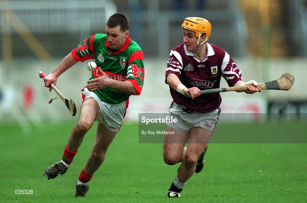 13 February 2000; Declan Pilkington of Birr in action against Brian Higgins of Athenry during the AIB All-Ireland Senior Club Hurling Championship Semi-Final match between Athenry and Birr at Semple Stadium in Thurles, Tipperary. Photo by Ray McManus/Sportsfile *** Local Caption ***