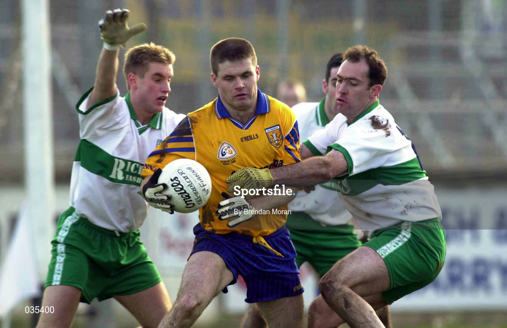 21 November 1999; Dessie Farrell of Na Fianna in action against Niall Collins, left, Thomas Conroy and Aidan Fennelly of Portlaoise during the AIB Leinster Senior Club Football Championship Semi-Final match between Na Fianna and Portlaoise at St Conleth's Park in Newbridge, Kildare. Photo by Brendan Moran/Sportsfile