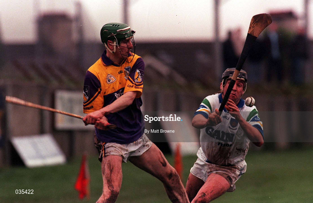 27 February 2000; Donal Berry of Wexford in action against Dave Bennett of Waterford during the Church & General National Hurling League Division 1B Round 2 match between Waterford and Wexford at Walsh Park in Waterford. Photo by Matt Browne/Sportsfile