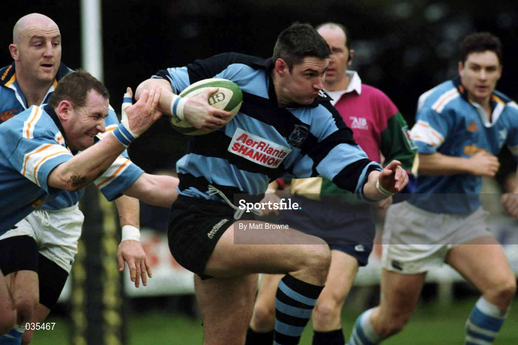 13 February 2000; Eddie Halvey of Shannon is tackled by Paul Neville of Garryowen during the AIB All-Ireland League Division 1 match between Garryowen and Shannon at Dooradoyle in Limerick. Photo by Matt Browne/Sportsfile