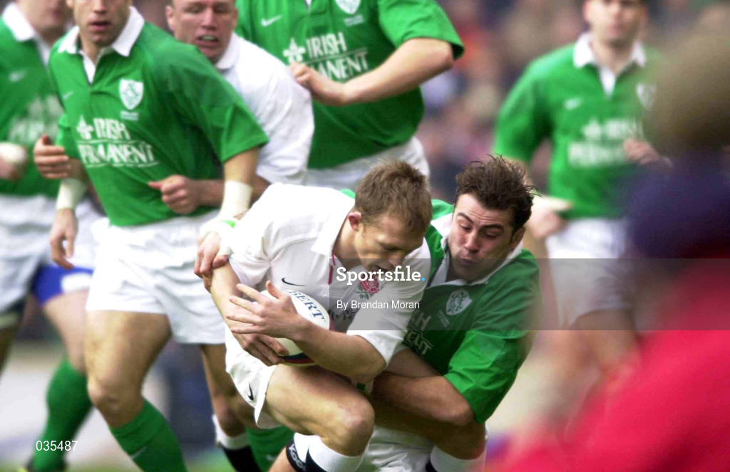 5 February 2000; Matt Dawson of England is tackled by Kieron Dawson of Ireland during the Lloyds TSB 6 Nations match between England and Ireland at Twickenham Stadium in London, England. Photo by Brendan Moran/Sportsfile