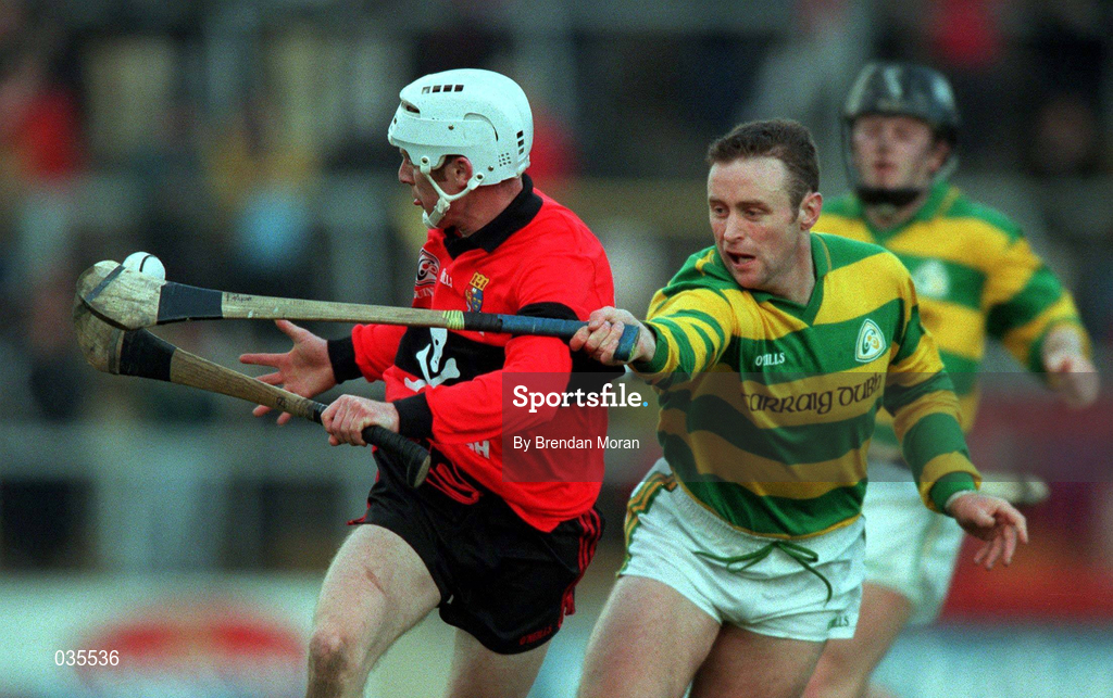 31 October 1999; Johnny Enright of UCC gets past Fergal Ryan of Blackrock during the Cork County Senior Club Hurling Championship Final match between Blackrock and UCC at Páirc Uí Chaoimh in Cork. Photo by Brendan Moran/Sportsfile