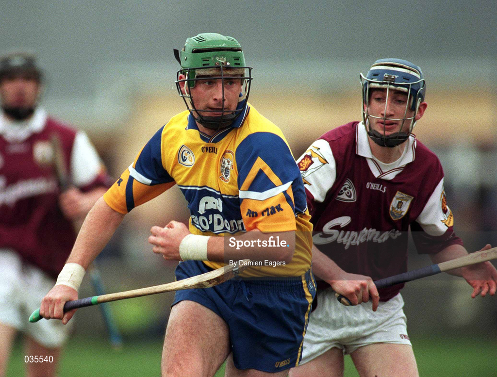 27 February 2000; Fergus Flynn of Clare in action against Mark Kerins of Galway during the Church & General National Hurling League Division 1A Round 2 match between Clare and Galway at Hennessy Park in Miltown Malbay, Clare. Photo by Damien Eagers/Sportsfile