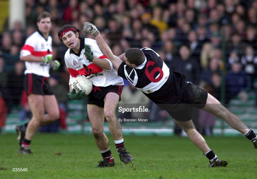 12 December 1999; Fionán Kelleher of UCC in action against Kieran Burns of Doonbeg during the AIB Munster Senior Club Football Championship Final match between UCC and Doonbeg at the Gaelic Grounds in Limerick. Photo by Brendan Moran/Sportsfile