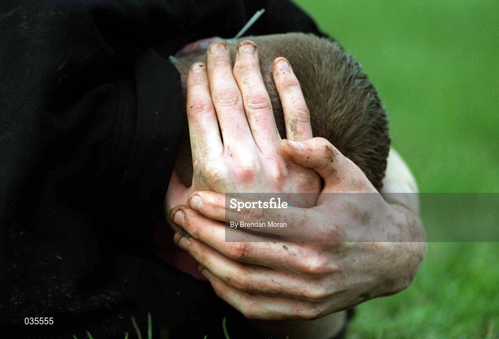 12 February 2000; An injured rugby player during the AIB League Division 1 match between Young Munster and Terenure College at Tom Clifford Park in Limerick. Photo by Brendan Moran/Sportsfile