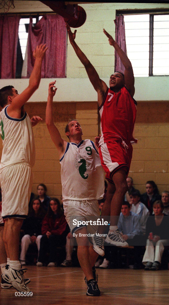 7 November 1999; Joseph Haastrup of Tolka Rovers in action against Eamonn Sheehan, left, and Niall O'Sullivan of Waterford Crystal during the ESB Men's Superleague Basketball match between Tolka Rovers and Waterford Crystal at Griffith Avenue in Dublin. Photo by Brendan Moran/Sportsfile