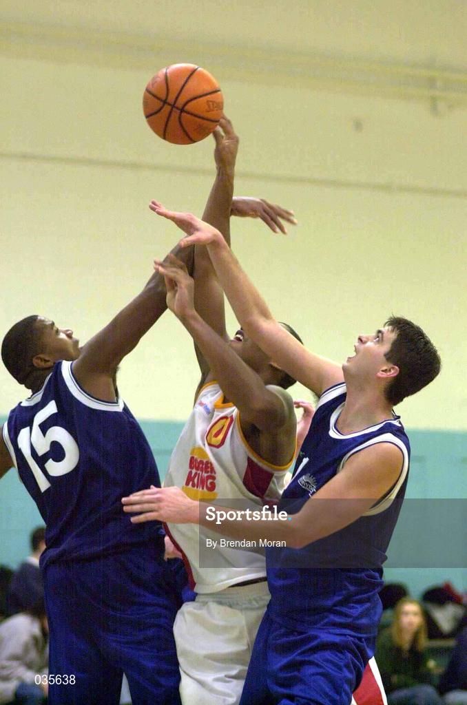4 December 1999; Kareem Lewis of BK Limerick in action against Ferdinand Williams, left, and Brian Tonkovich of St Vincent's during the ESB Men's Superleague Basketball match between St Vincent's and BK Limerick at St Vincent's Basketball Club in Glasnevin, Dublin. Photo by Brendan Moran/Sportsfile