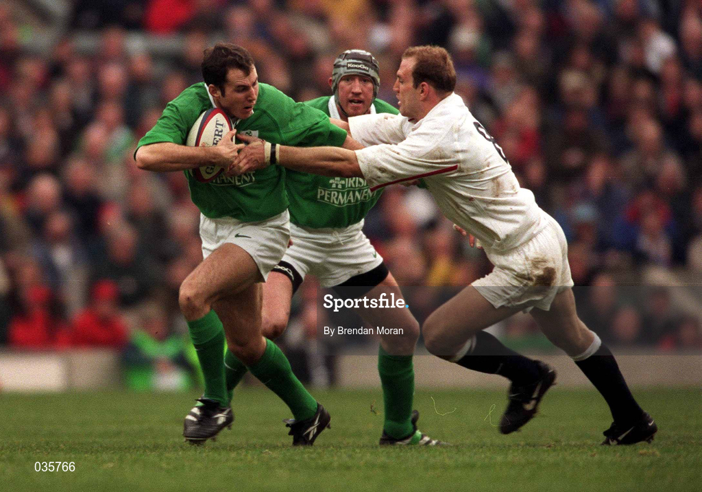 5 February 2000; Girvan Dempsey of Ireland is tackled by Lawerence Dallaglio of England during the Lloyds TSB 6 Nations match between England and Ireland at Twickenham Stadium in London, England. Photo by Brendan Moran/Sportsfile