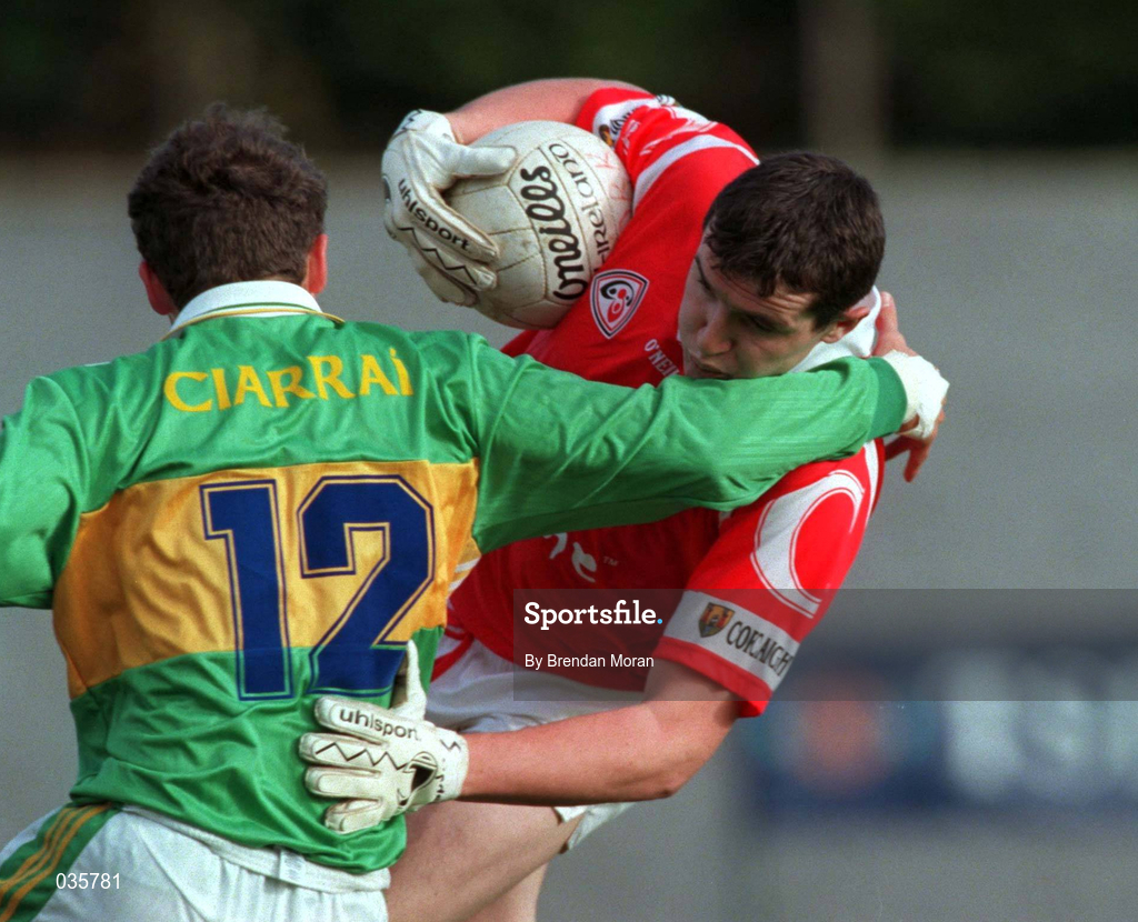 30 October 1999; Graham Canty of Cork in action against John McGlynn of Kerry during the Church & General National Football League Division 1A Round 1 match between Cork and Kerry at Páirc Uí Rinn in Cork. Photo by Brendan Moran/Sportsfile