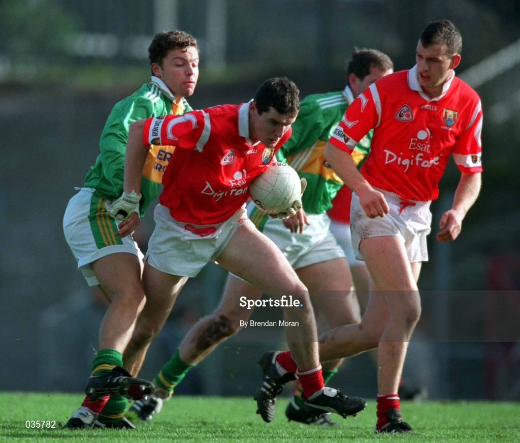 30 October 1999; Graham Canty of Cork in action against John McGlynn of Kerry during the Church & General National Football League Division 1A Round 1 match between Cork and Kerry at Páirc Uí Rinn in Cork. Photo by Brendan Moran/Sportsfile