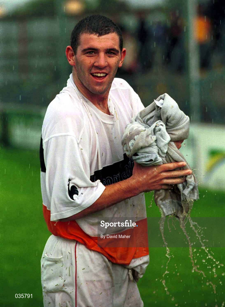 25 September 1999; Greg O'Halloran of Cork City squeezes the water from his shirt after referee Hugh Byrne called off the game due to a waterlogged pitch. Eircom League Premier Division match between Cork City and UCD at Turners Cross in Cork. Photo by David Maher/Sportsfile