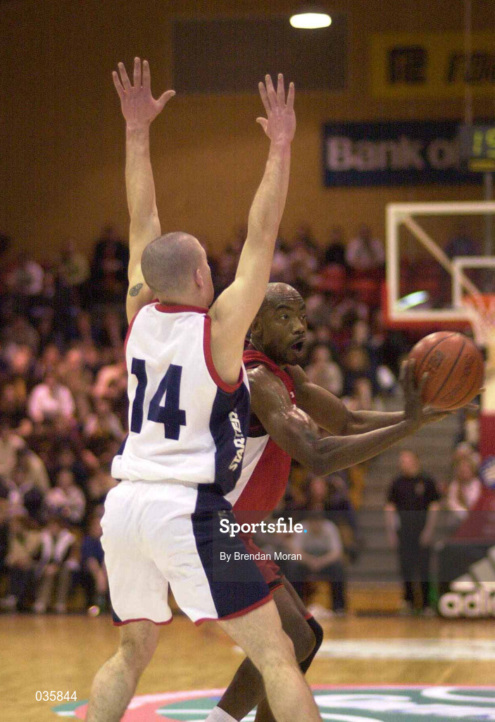 28 January 2000; Lennie McMillan of Tolka Rovers in action against Ciaran Dempsey of Denny Notre Dame during the Senior Men's Sprite Cup Semi-Final match between Tolka Rovers and Denny Notre Dame at National Basketball Arena in Tallaght, Dublin. Photo by Brendan Moran/Sportsfile
