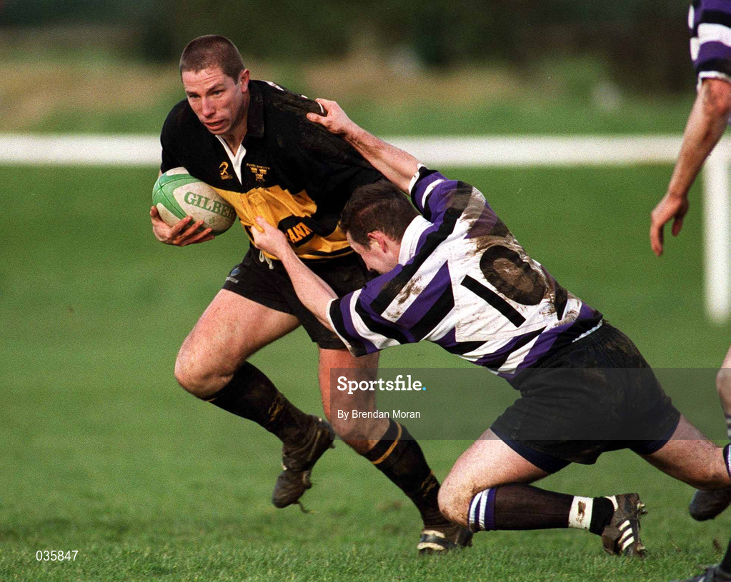 12 February 2000; Leo Doyle of Young Munster in action against Richard Governey of Terenure College during the AIB League Division 1 match between Young Munster and Terenure College at Tom Clifford Park in Limerick. Photo by Brendan Moran/Sportsfile