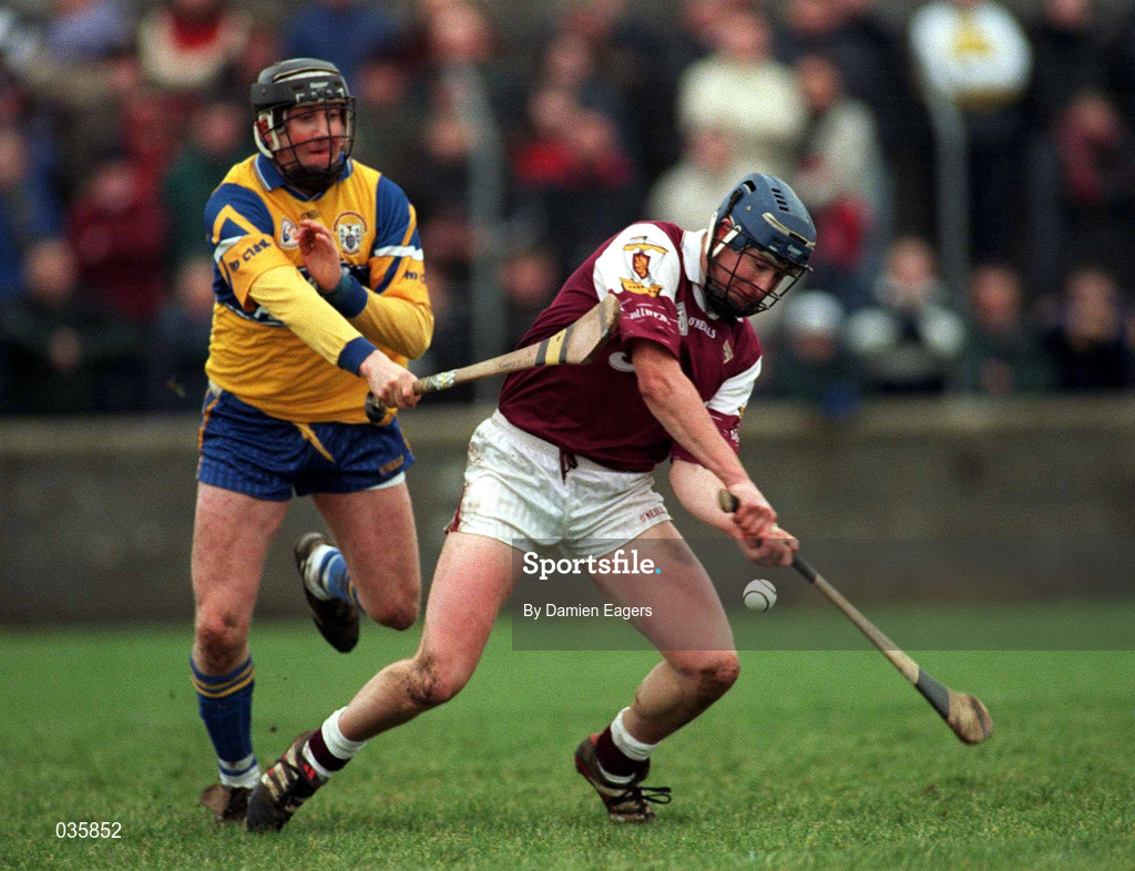 27 February 2000; Liam Hodgkins of Galway in action against Conor Clancy of Clare during the Church & General National Hurling League Division 1A Round 2 match between Clare and Galway at Hennessy Park in Miltown Malbay, Clare. Photo by Damien Eagers/Sportsfile