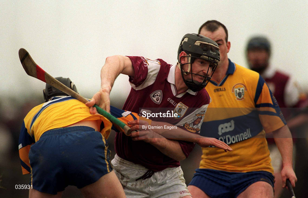 27 February 2000; Noel Larkin of Galway in action against Tony Griffin and Ollie Baker, right, during the Church & General National Hurling League Division 1A Round 2 match between Clare and Galway at Hennessy Park in Miltown Malbay, Clare. Photo by Damien Eagers/Sportsfile