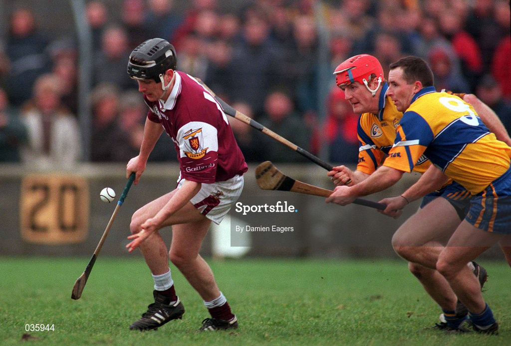 27 February 2000; Ollie Fahy of Galway in action against Brian Lohan and Colin Lynch, 9, of Clare during the Church & General National Hurling League Division 1A Round 2 match between Clare and Galway at Hennessy Park in Miltown Malbay, Clare. Photo by Damien Eagers/Sportsfile