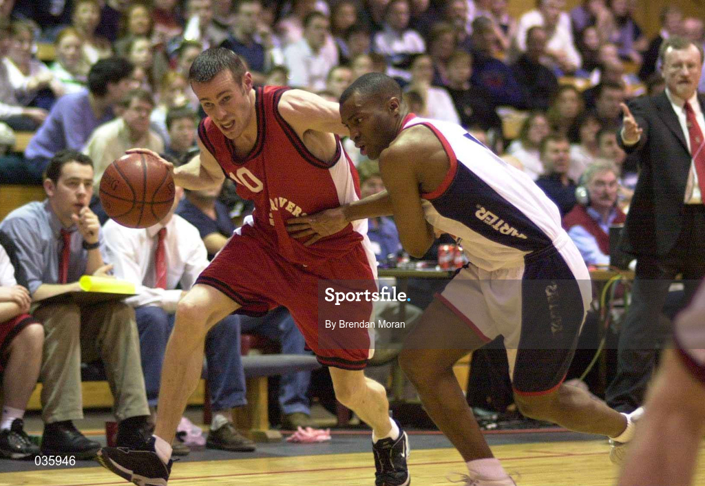 28 January 2000; Paddy Boylan of Tolka Rovers in action against Brian Benjamin of Denny Notre Dame during the Senior Men's Sprite Cup Semi-Final match between Tolka Rovers and Denny Notre Dame at National Basketball Arena in Tallaght, Dublin. Photo by Brendan Moran/Sportsfile