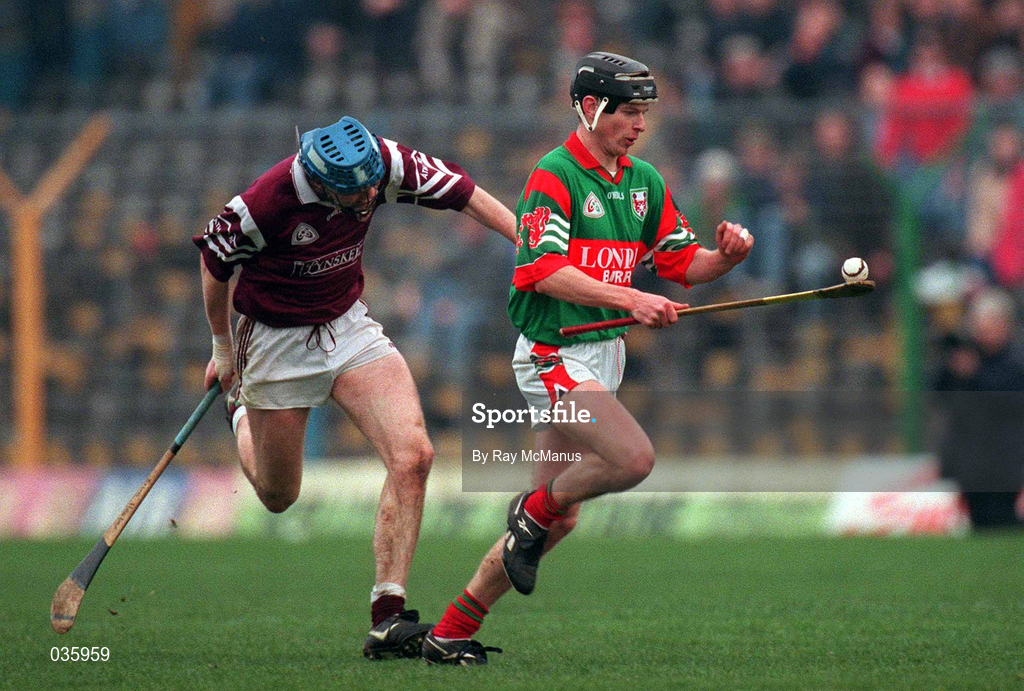 13 February 2000; Paul Molloy of Birr in action against Brian Hanley of Athenry during the AIB All-Ireland Senior Club Hurling Championship Semi-Final match between Athenry and Birr at Semple Stadium in Thurles, Tipperary. Photo by Ray McManus/Sportsfile *** Local Caption ***
