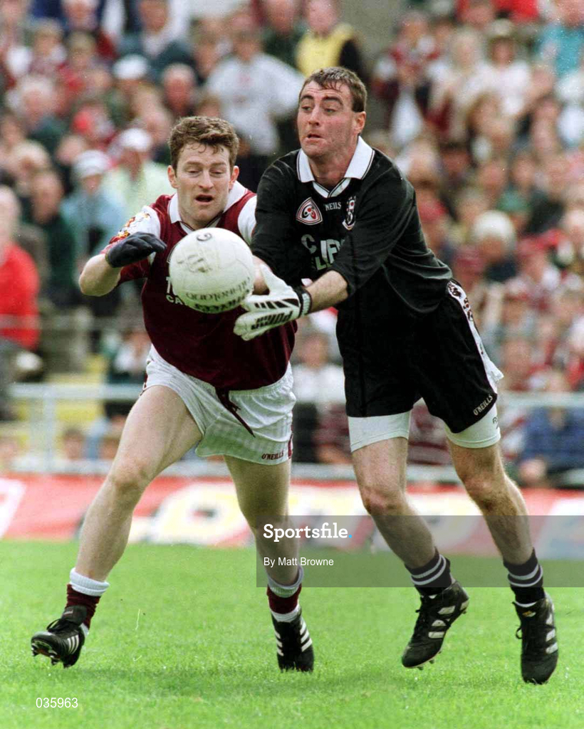 27 June 1999; Sligo goalkeeper Peter Walsh is tackled by Jarlath Fallon of Galway during the Bank of Ireland Connacht Senior Football Championship Semi-Final match between Sligo and Galway at Markievicz Park in Sligo. Photo by Matt Browne/Sportsfile