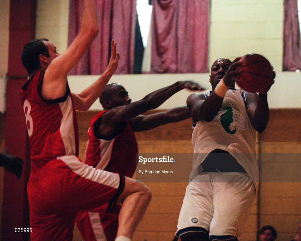 7 November 1999; Roscoe Patterson of Waterford Crystal, right, in action against Mike Quill, left, and Lennie McMillan of Tolka Rovers during the ESB Men's Superleague Basketball match between Tolka Rovers and Waterford Crystal at Griffith Avenue in Dublin. Photo by Brendan Moran/Sportsfile