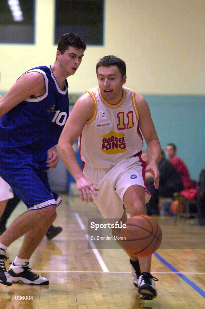 4 December 1999. Scott Ross of BK Limerick in action against Brian Tonkovich of St Vincent's during the ESB Men's Superleague Basketball match between St Vincent's and BK Limerick at St Vincent's Basketball Club in Glasnevin, Dublin. Photo by Brendan Moran/Sportsfile