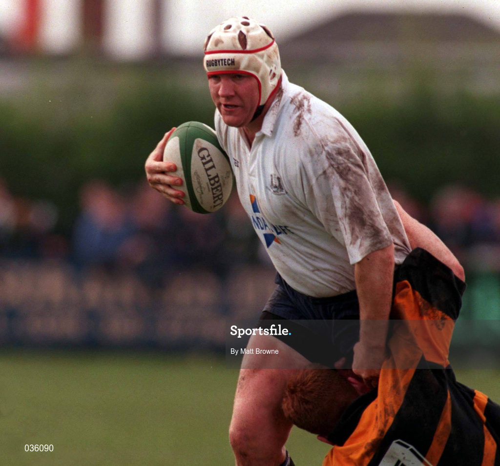 25 April 1999; Ultan O'Callaghan of Cork Constitution is tackled by Owen Brennan of Buccaneers during the AIB Rugby League Division 1 Semi-Final match between Cork Constitution v Buccaneers at Temple Hill in Cork. Photo by Matt Browne/Sportsfile