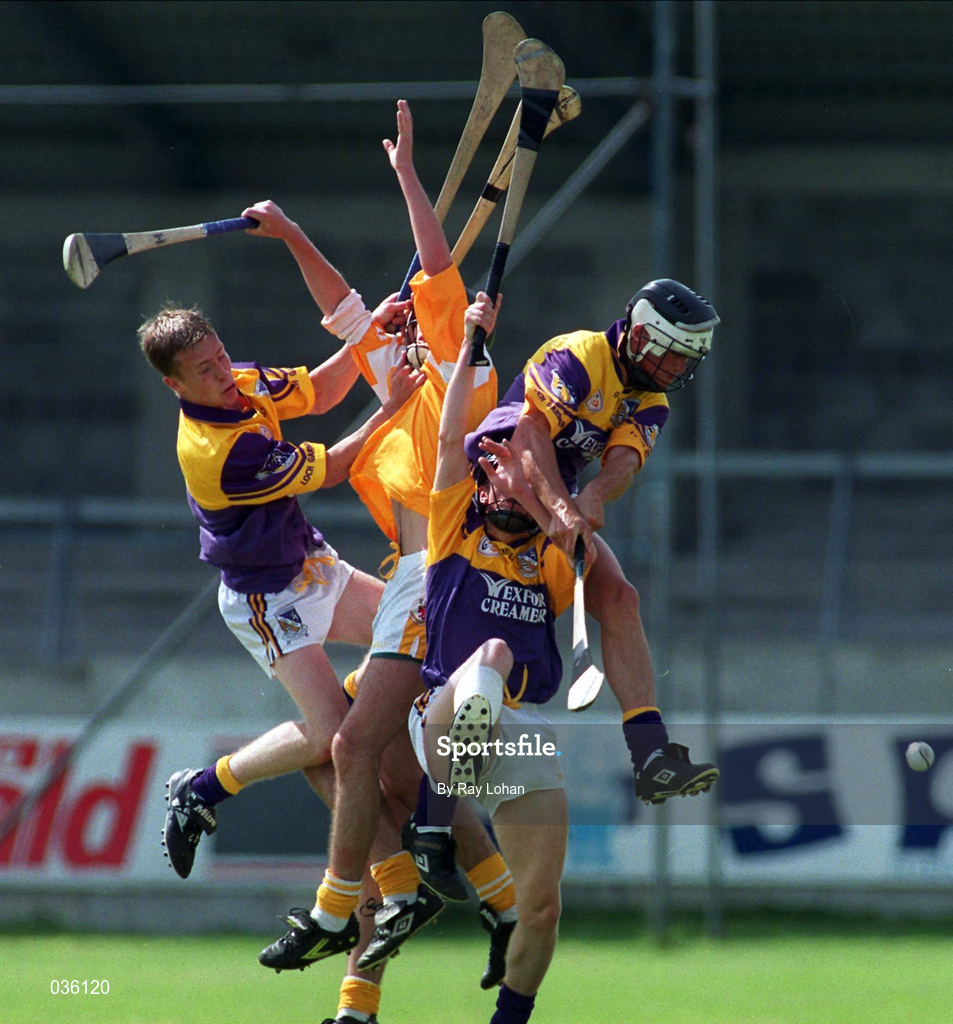 24 July 1999; Action from the during the All-Ireland Minor Hurling Championship Quarter-Final match between Antrim and Wexford at Parnell Park in Dublin. Photo by Ray Lohan/Sportsfile