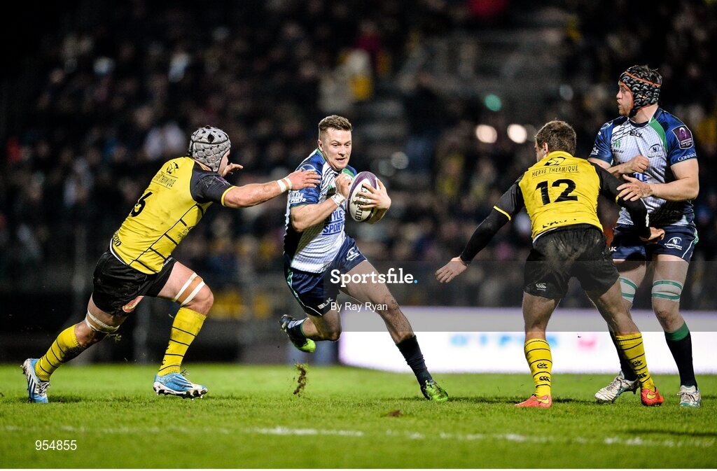24 January 2015; Jack Carty, Connacht, is tackled by  Nicolas Djebaiu, La Rochelle. European Rugby Champions Cup 2014/15, Pool 2, Round 6, La Rochelle v Connacht, Stade Marcel Deflandre, La Rochelle, France. Picture credit: Ray Ryan / SPORTSFILE