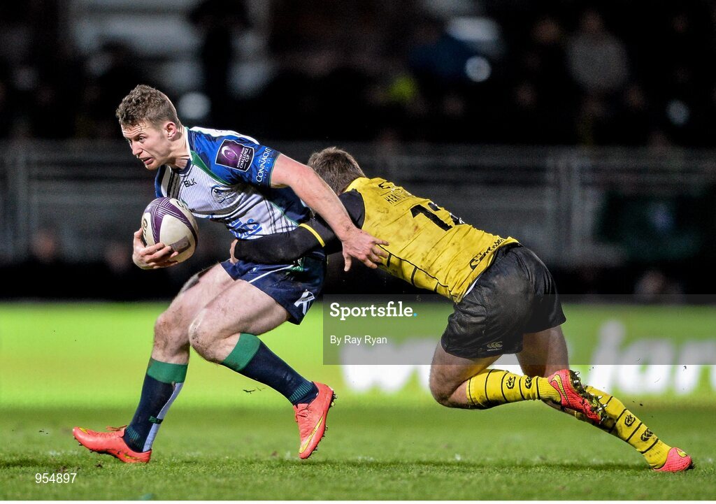 24 January 2015; Matt Healy, Connacht, is tackled by Charles Bouldoire, La Rochelle. European Rugby Champions Cup 2014/15, Pool 2, Round 6, La Rochelle v Connacht, Stade Marcel Deflandre, La Rochelle, France. Picture credit: Ray Ryan / SPORTSFILE