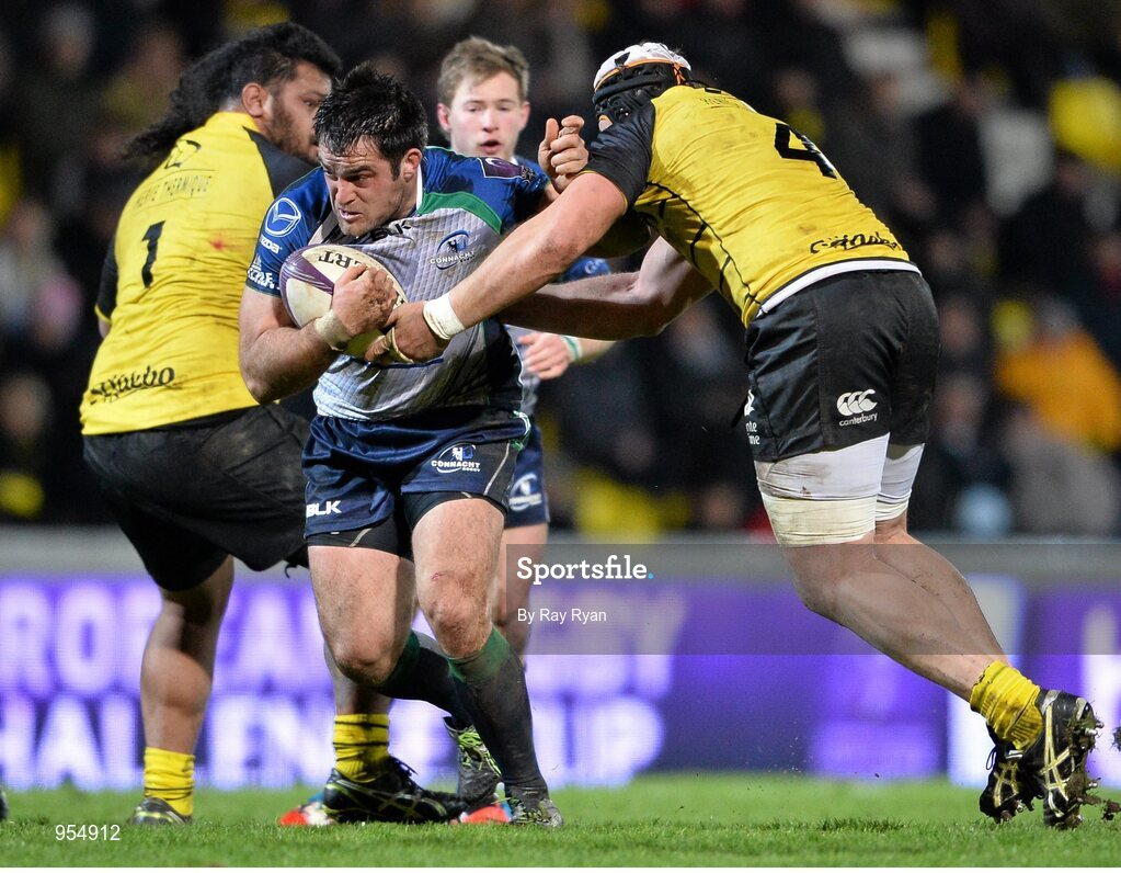 24 January 2015; Ronan Loughney, Connacht, is tackled by Vincent Pelo and Mathieu Tanguy, La Rochelle. European Rugby Champions Cup 2014/15, Pool 2, Round 6, La Rochelle v Connacht, Stade Marcel Deflandre, La Rochelle, France. Picture credit: Ray Ryan / SPORTSFILE