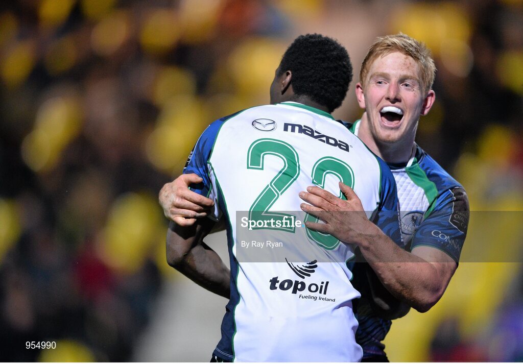 24 January 2015; Niyi Adeolokun, Connacht, is congratulated by Darragh Leader after scoring their side's third try. European Rugby Champions Cup 2014/15, Pool 2, Round 6, La Rochelle v Connacht, Stade Marcel Deflandre, La Rochelle, France. Picture credit: Ray Ryan / SPORTSFILE