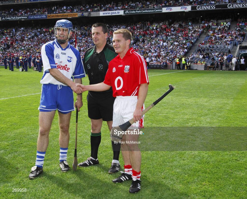 29 July 2007; Waterford captain Michael Walsh and Cork captain Joe Deane shake hands in front of referee Brian Gavin. Guinness All-Ireland Senior Hurling Championship Quarter-Final, Cork v Waterford, Croke Park, Dublin. Picture credit; Ray McManus / SPORTSFILE