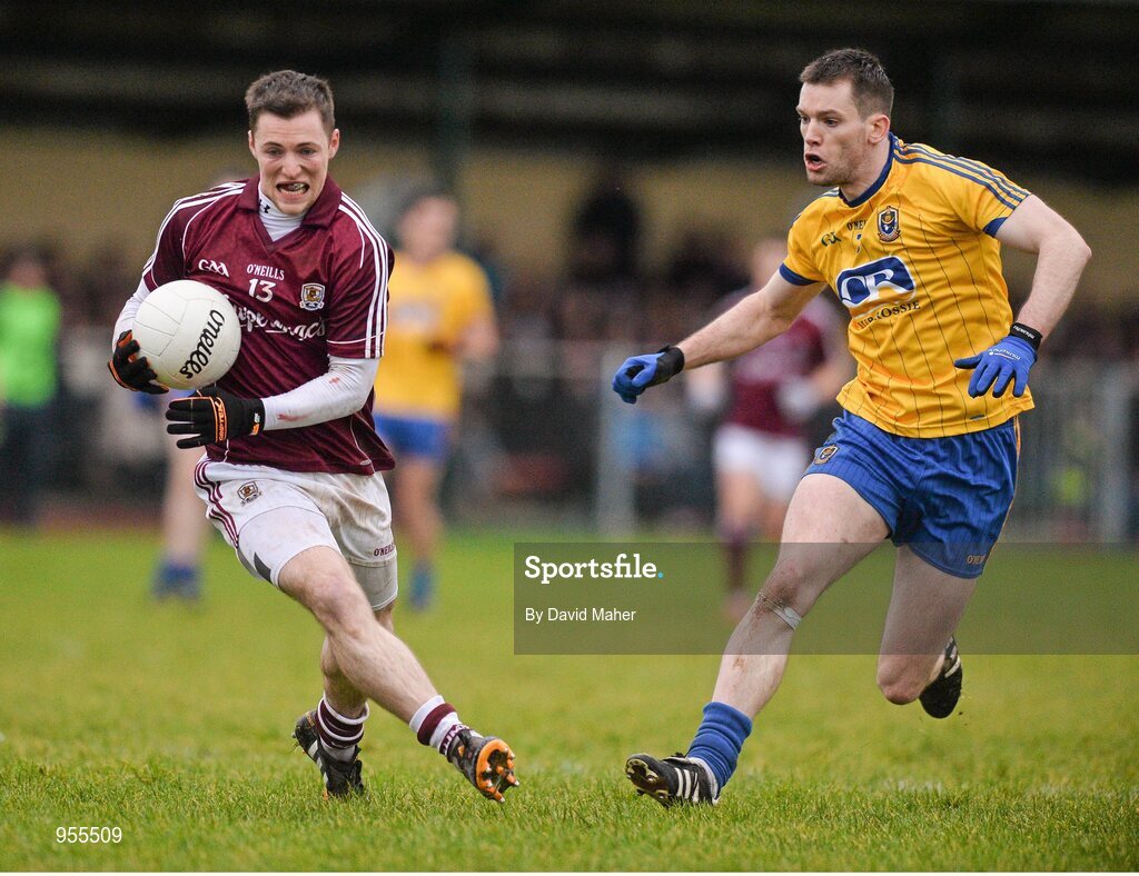 25 January 2015; Danny Cummins, Galway, in action against Niall Carty, Roscommon. FBD Connacht League Final, Roscommon v Galway, Kiltoom, Co. Roscommon. Picture credit: David Maher / SPORTSFILE