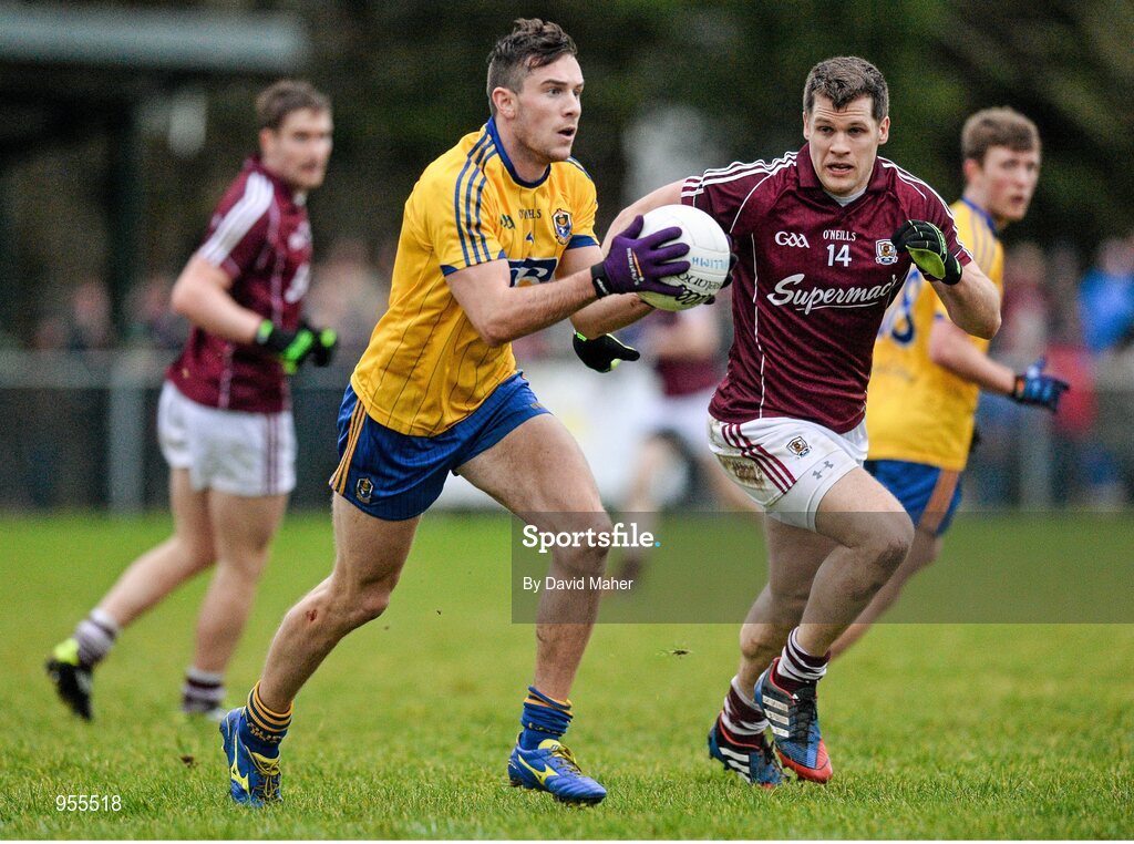 25 January 2015; Neil Collins, Roscommon, in action against Eddie Hoare, Galway. FBD Connacht League Final, Roscommon v Galway, Kiltoom, Co. Roscommon. Picture credit: David Maher / SPORTSFILE