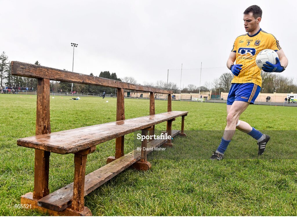 25 January 2015;  Roscommon captain Niall Carty arriving at the team bench before the official photograph. FBD Connacht League Final, Roscommon v Galway, Kiltoom, Co. Roscommon. Picture credit: David Maher / SPORTSFILE