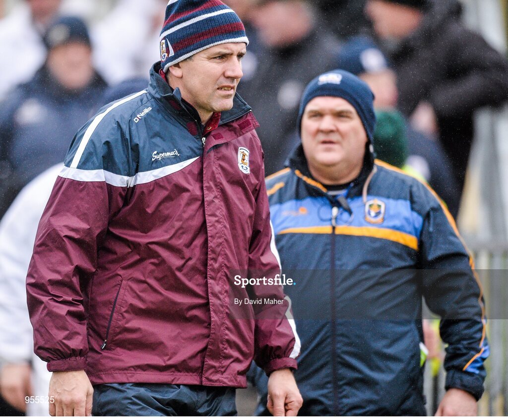25 January 2015; Galway manager Kevin Walsh alongside Roscommon manager John Evans. FBD Connacht League Final, Roscommon v Galway, Kiltoom, Co. Roscommon. Picture credit: David Maher / SPORTSFILE