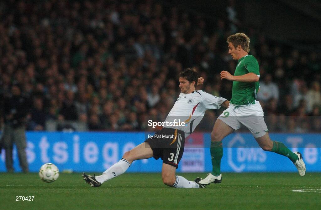 13 October 2007; Arne Friedrich, Germany, in action against Kevin Doyle, Republic of Ireland. 2008 European Championship Qualifier, Republic of Ireland v Germany, Croke Park, Dublin. Picture credit; Pat Murphy / SPORTSFILE