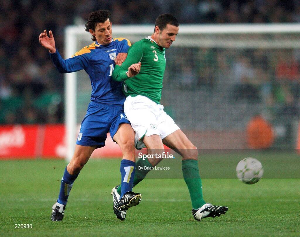 17 October 2007; John O'Shea, Republic of Ireland, in action against Yiasoumis Yiasoumi, Cyprus. 2008 European Championship Qualifier, Republic of Ireland v Cyprus, Croke Park, Dublin. Picture credit; Brian Lawless / SPORTSFILE